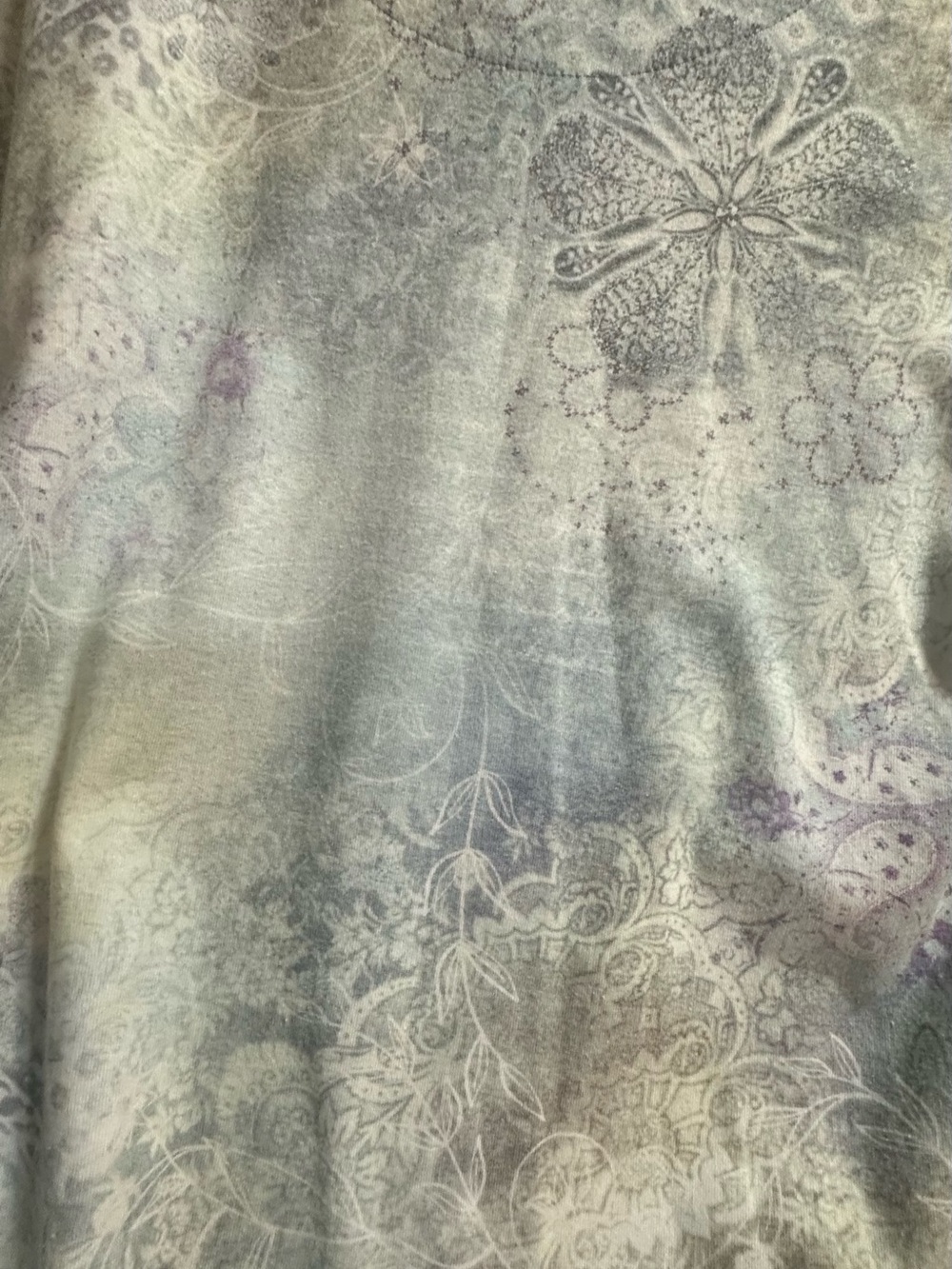Light Blue Floral Scoop Neck Women's Top with a front flower with gem accents. - Picture 6 of 9